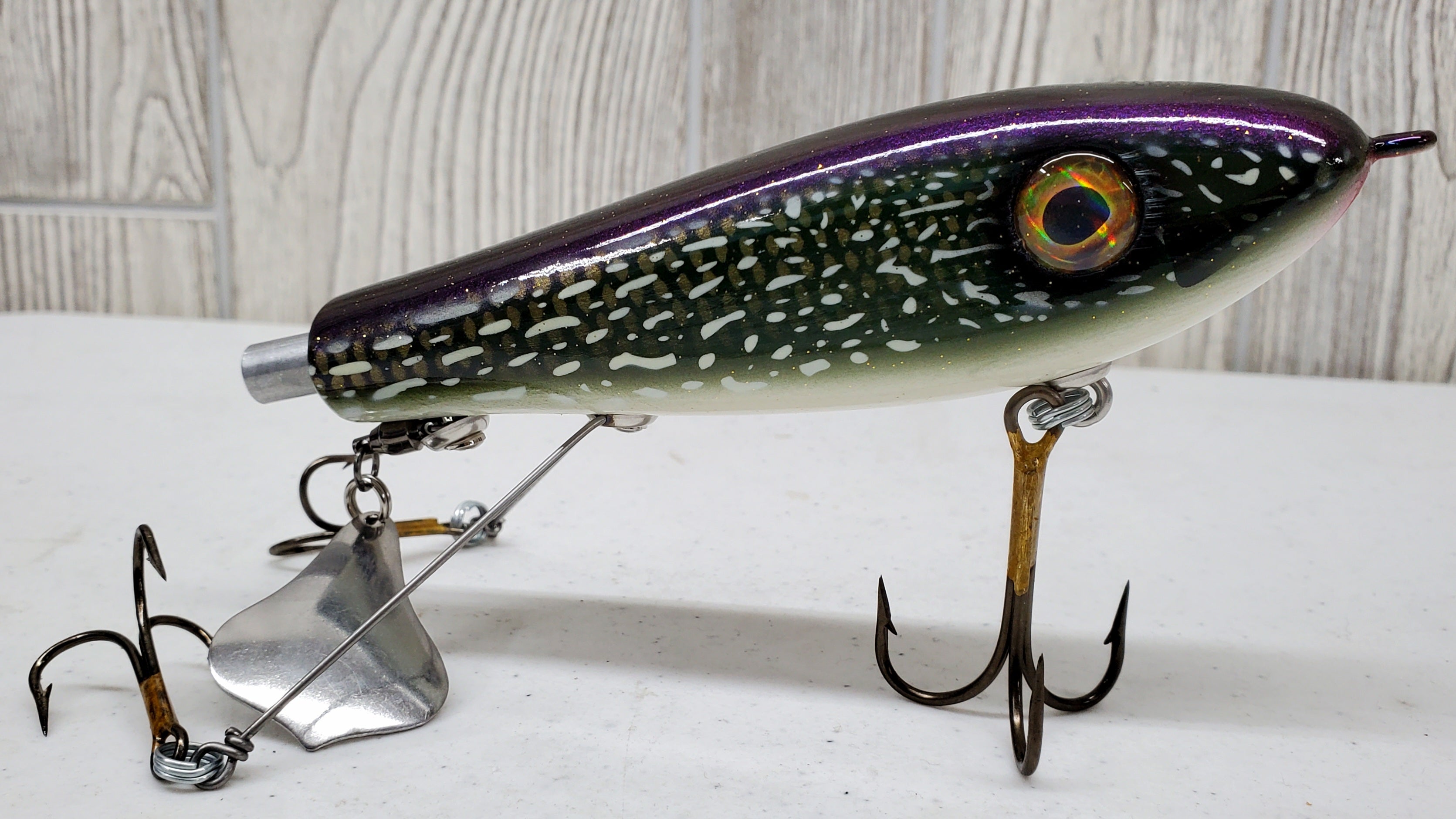 Eight vintage fishing lures incl Heddon Baby